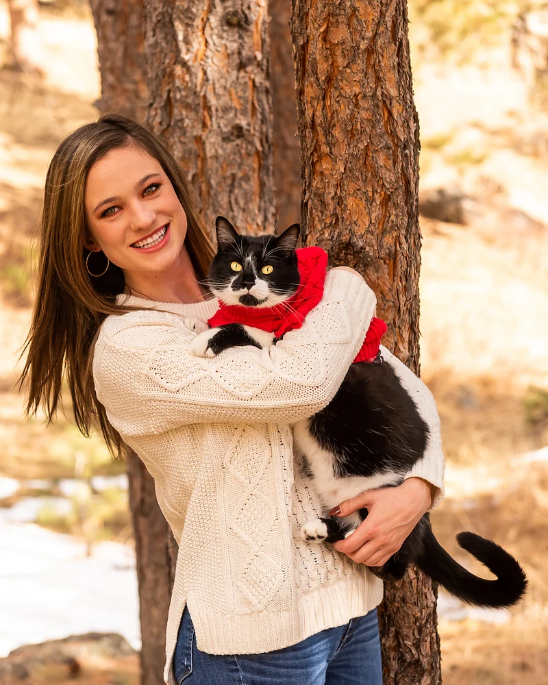 Cat Mom Captions For Instagram with a woman cuddling her cat