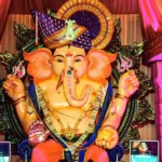 Ganpati Captions For Instagram with a beautifully decorated Ganpati idol