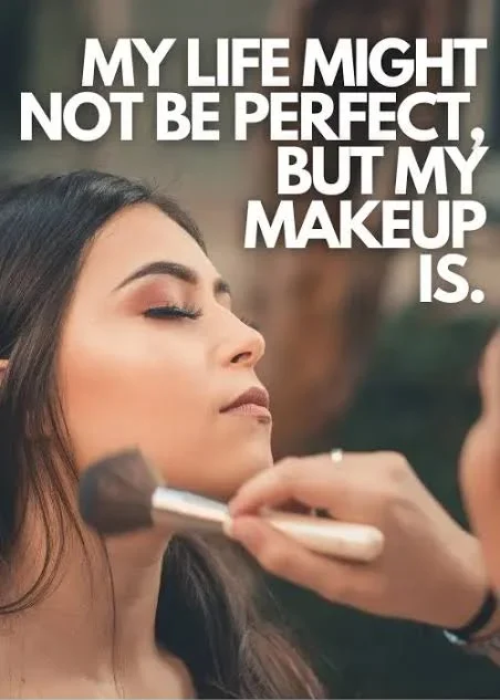 Makeup Artist Captions For Instagram: Vertical photograph of a woman with eyes closed receiving a makeup application, as a makeup brush is being applied to her face. Above her, bold white text reads "MY LIFE MIGHT NOT BE PERFECT, BUT MY MAKEUP IS.", with "THE ROAD TRIP EXPERT" branding at the bottom.