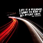 Night Ride Captions For Instagram: Long-exposure night photograph of a winding highway showing red and white light trails left by moving vehicles against a black background. On the top-right side, white stylized handwritten text quotes Tom Cochrane: "LIFE IS A HIGHWAY. I WANT TO RIDE IT ALL NIGHT LONG."