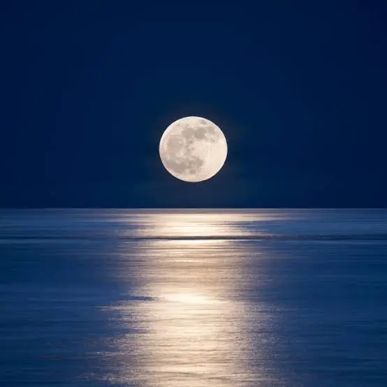 Moon Captions Instagram ideas with a bright moon above mountains and a peaceful night landscape