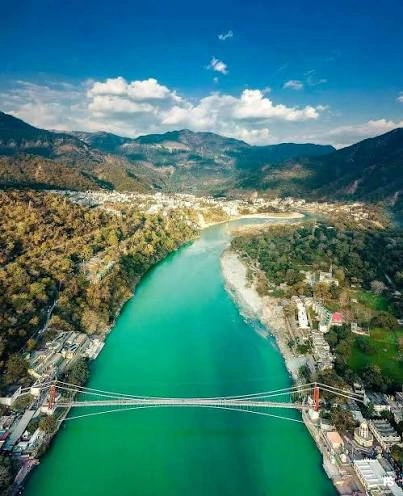Rishikesh Trip Captions For Instagram with Ganga River and Himalayan mountains
